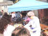And the food is finally ready... Gloria Hartman at the front serving