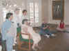 Fraternity members listening to Dwight Smith explain the needs at Isaiah House